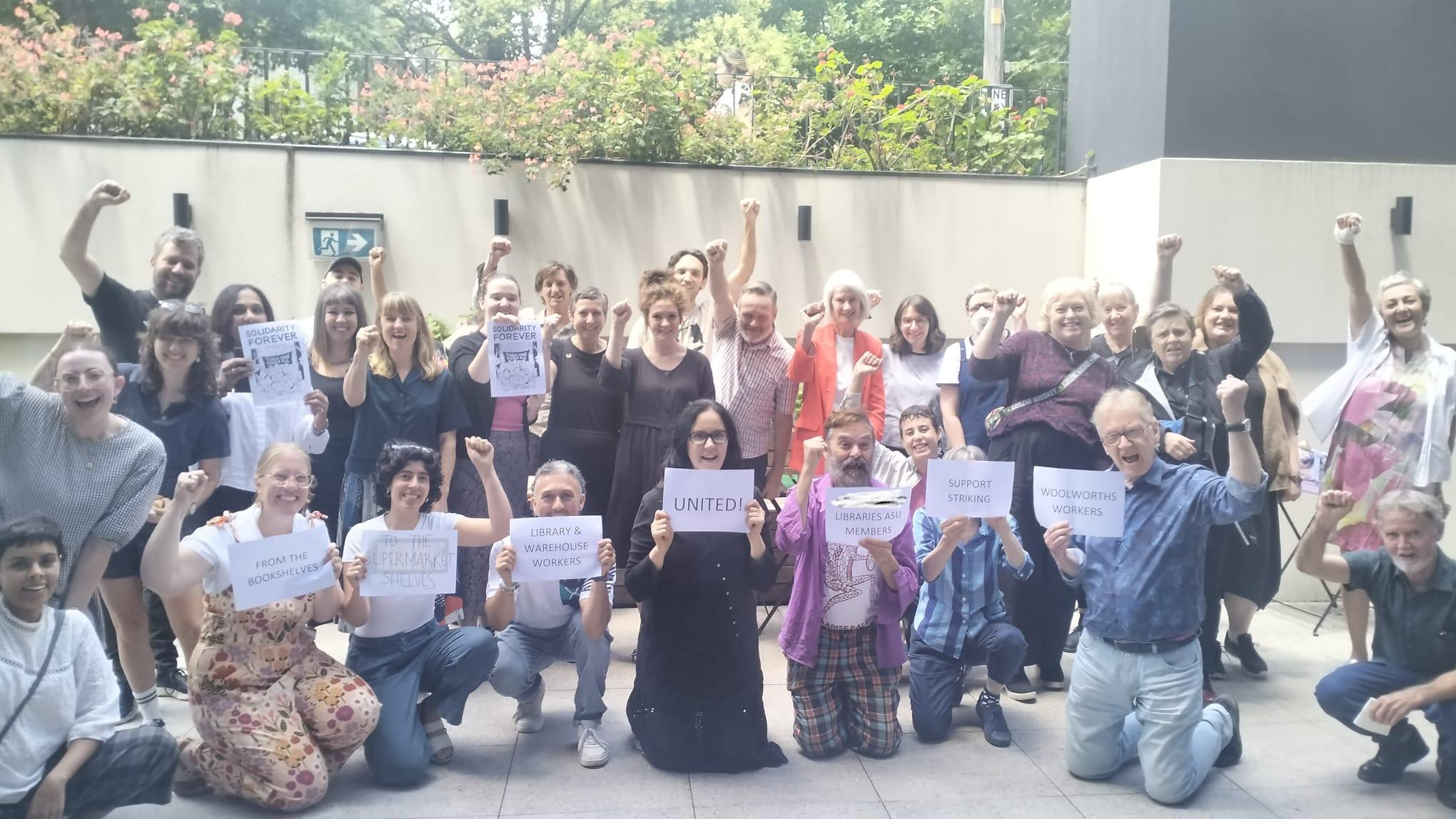 Melbourne library workers, members of the Australian Services Union, show solidarity with striking Woolies workers.